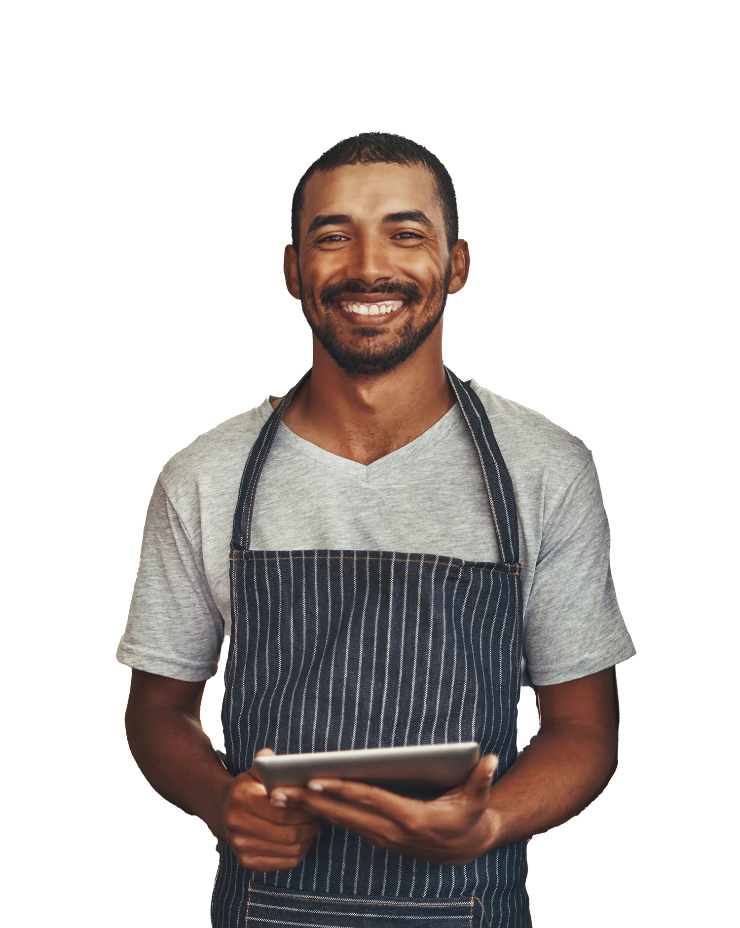 A restaurant operator in an apron, smiling, holding a tablet